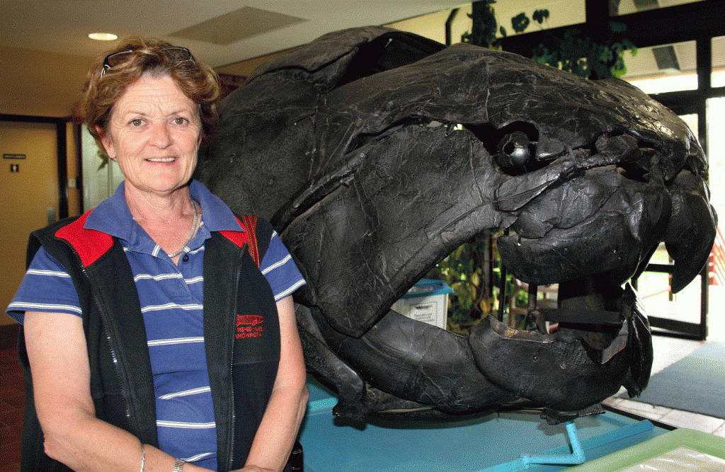 Fiona Ferguson and the museum’s star, Dunkleosteus terrelli, a Devonian armoured fish  