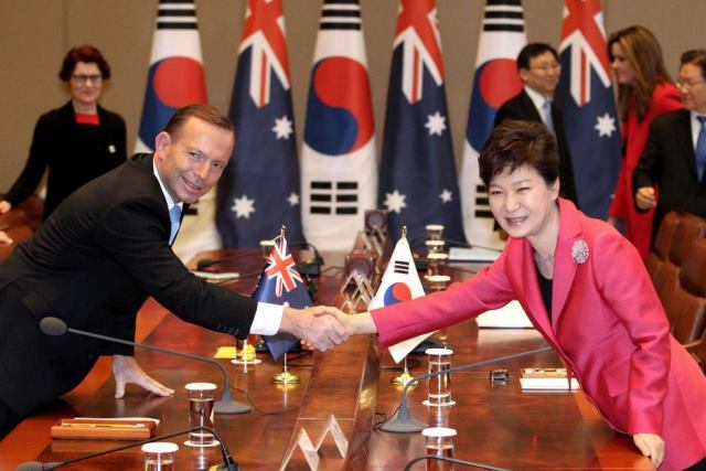 Prime Minister Tony Abbott shakes hands with South Korea's president Park Geun-hye. photo Ahn Young-joon