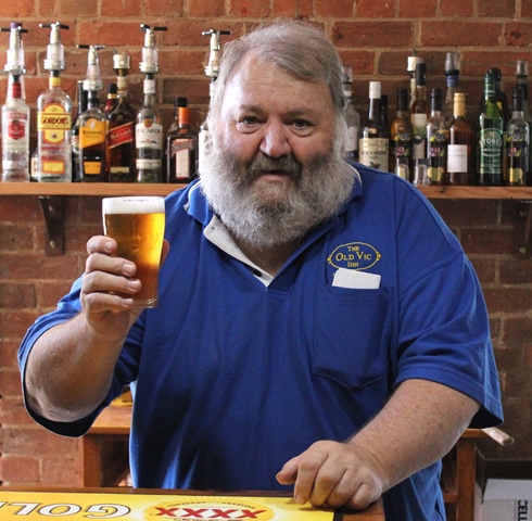 Graeme Beasley toasts with the first beer on tap since 1967